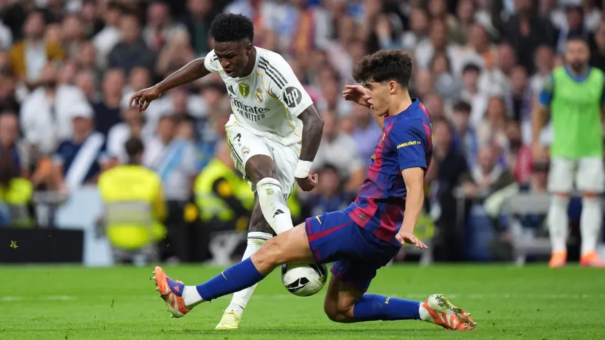 Vinicius Jr, astro do Real Madrid, e Pau Cubarsi, do Barcelona