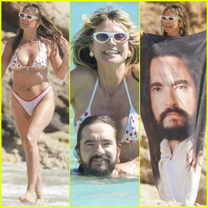 Heidi Klum e Tom Kaulitz aproveitam o dia de praia cheio de PDAs, completo com uma toalha divertida