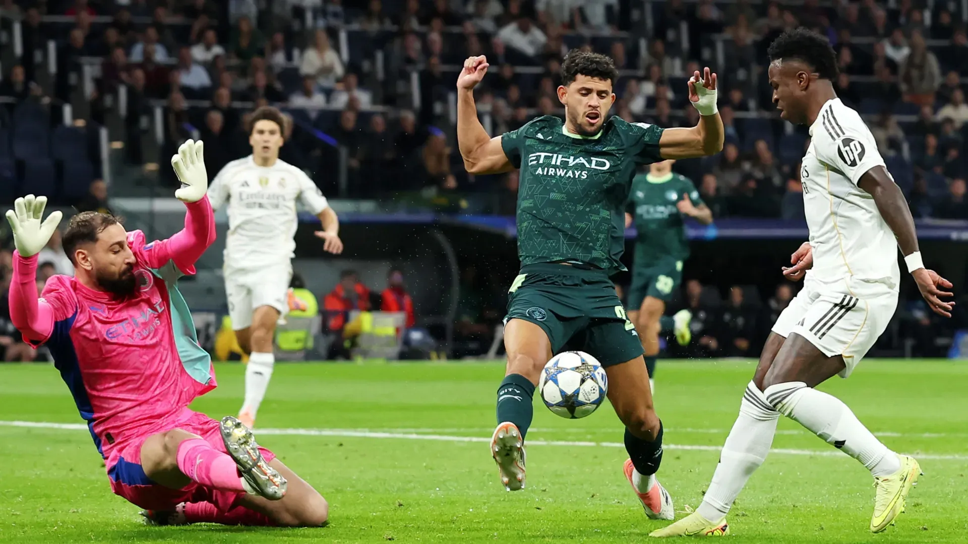 Vinicius Jr, do Real Madrid, e Matheus Nunes e Gianluigi Donnambumma, do Manchester City.