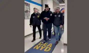 @RapidResponse47/DEA headquarters in Manhattan A still image from video posted by the White House's Rapid Response 47 account on X.com, which originated from the @PaulDMauro account, shows Venezuela's President Nicolas Maduro being walked in custody down a hallway at the offices of the U.S. Drug Enforcement Administration (DEA) in New York City, U.S., January 3, 2026. @RapidResponse47/Handout via REUTERS THIS IMAGE HAS BEEN SUPPLIED BY A THIRD PARTY. MANDATORY CREDIT.NO RESALES. NO ARCHIVES. THIS PICTURE WAS PROCESSED BY REUTERS TO ENHANCE QUALITY. AN UNPROCESSED VERSION HAS BEEN PROVIDED SEPARATELY. TPX IMAGES OF THE DAY
Verification
- Reuters was able to confirm footage of Nicolas Maduro walking through the halls of DEA headquarters in New York as seen on corroborating footage showing same personnels ushering Maduro and DEA NYD crest on the wall.
- Logo on wall matched DEA NYD from file images.
- Reuters witness footage showing convoy arriving at DEA headquarters in Manhattan.