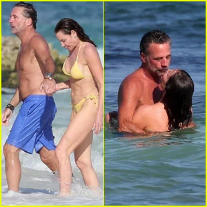 A estrela de 'Real Housewives' Luann De Lesseps e o namorado Michael Riemerschmid aproveitam um dia cheio de PDAs na praia