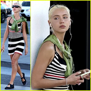 A filha de Jude Law, Iris Law, é flagrada usando tênis NikeSkims de bico dividido de Kim Kardashian