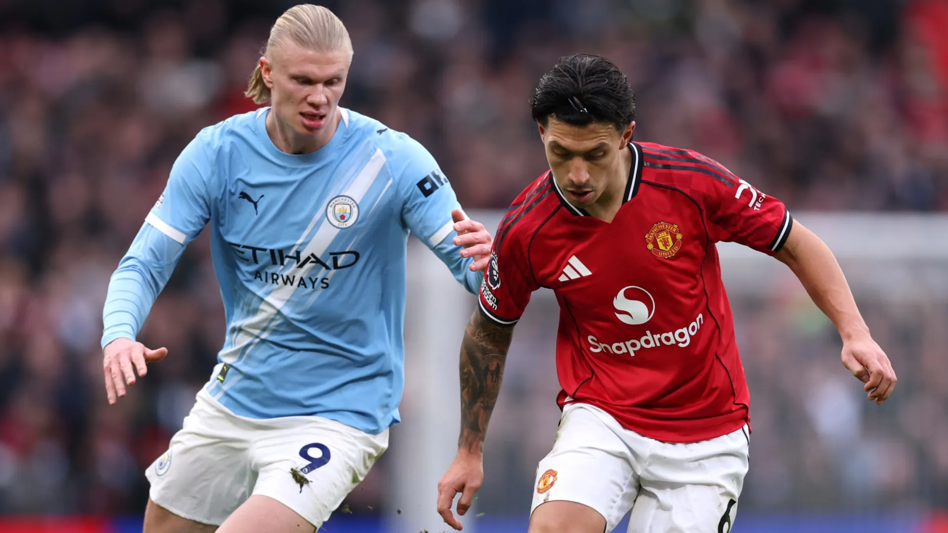 Erling Haaland do Manchester City e Lisandro Martinez do Manchester United