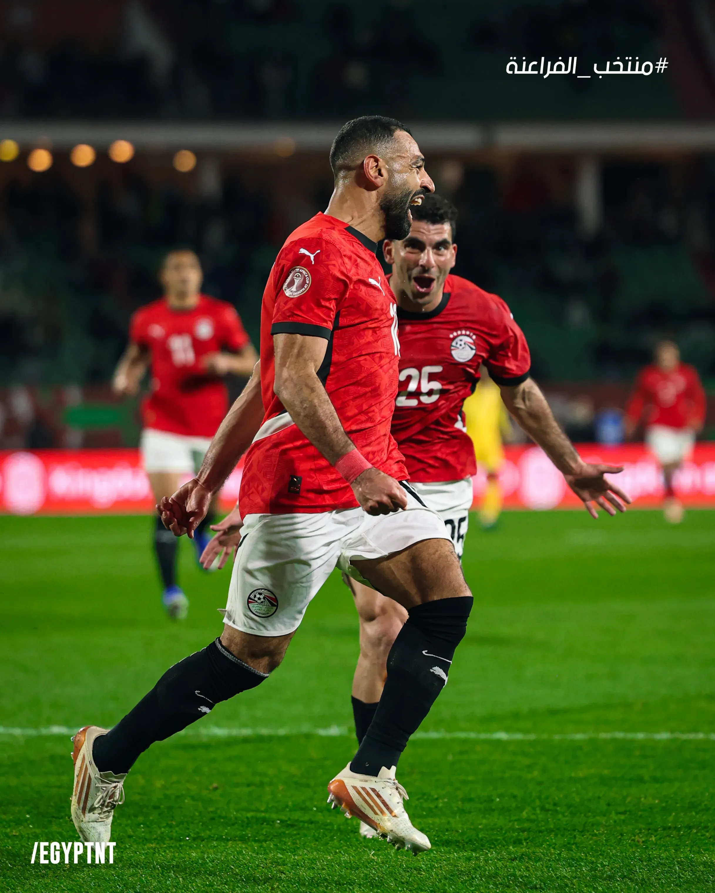 Mohamed Salah comemorando após marcar contra o Benin.