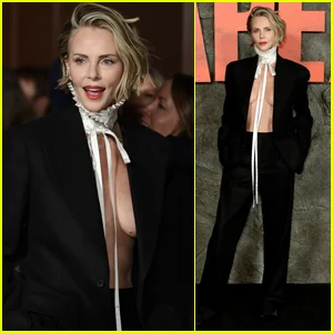 Charlize Theron faz topless sob o blazer na estreia de 'Apex' em Nova York