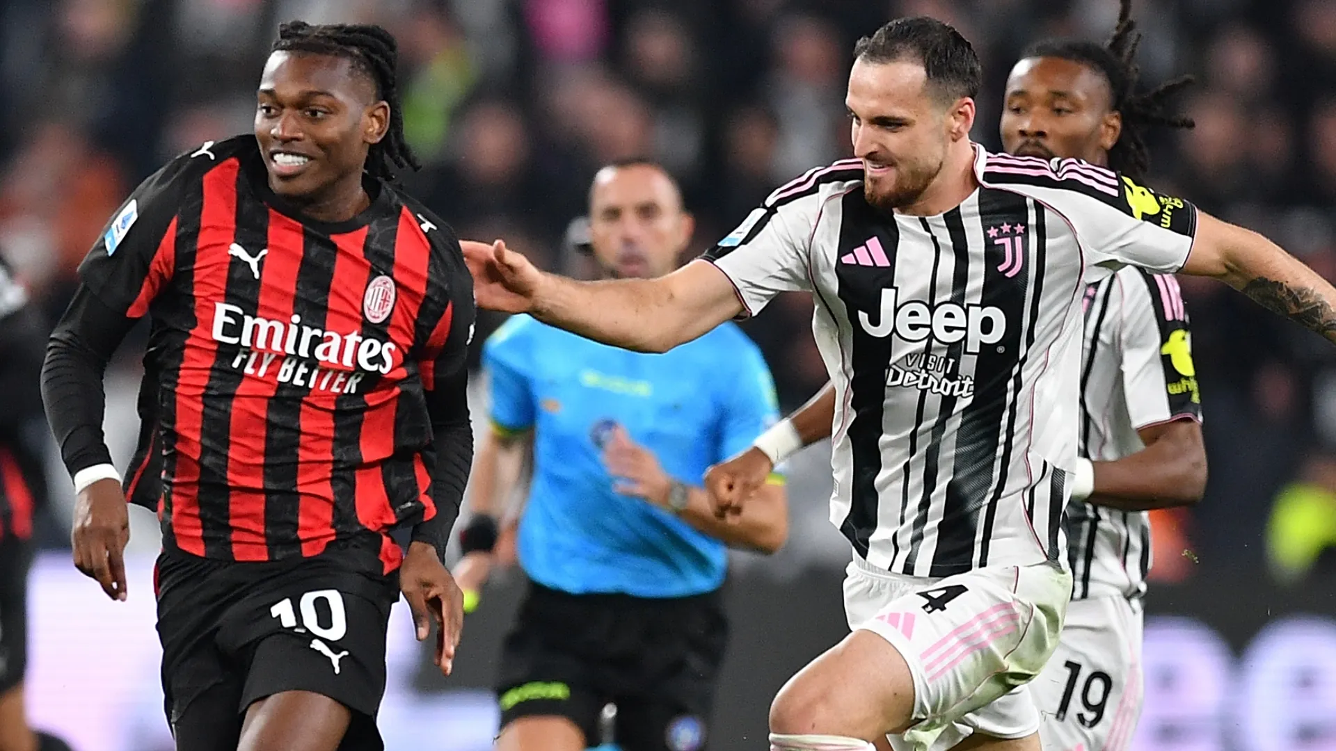 Federico Gatti of Juventus FC tackles Rafael Leao of AC Milan.