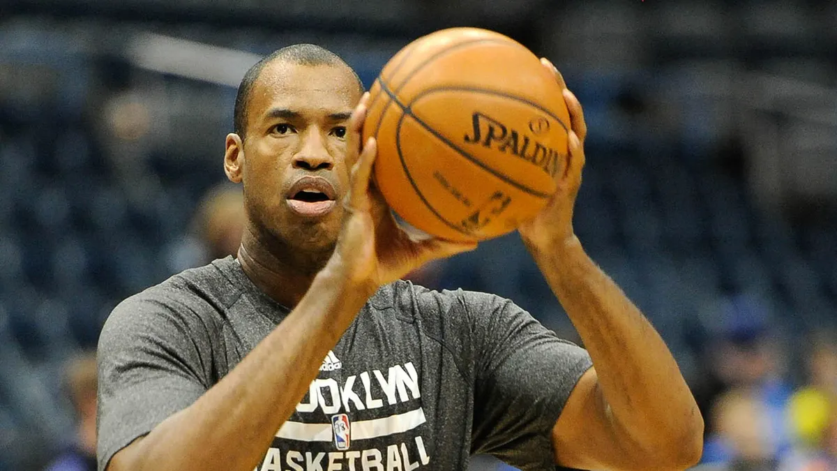 Brooklyn Nets center Jason Collins warming up on basketball court
