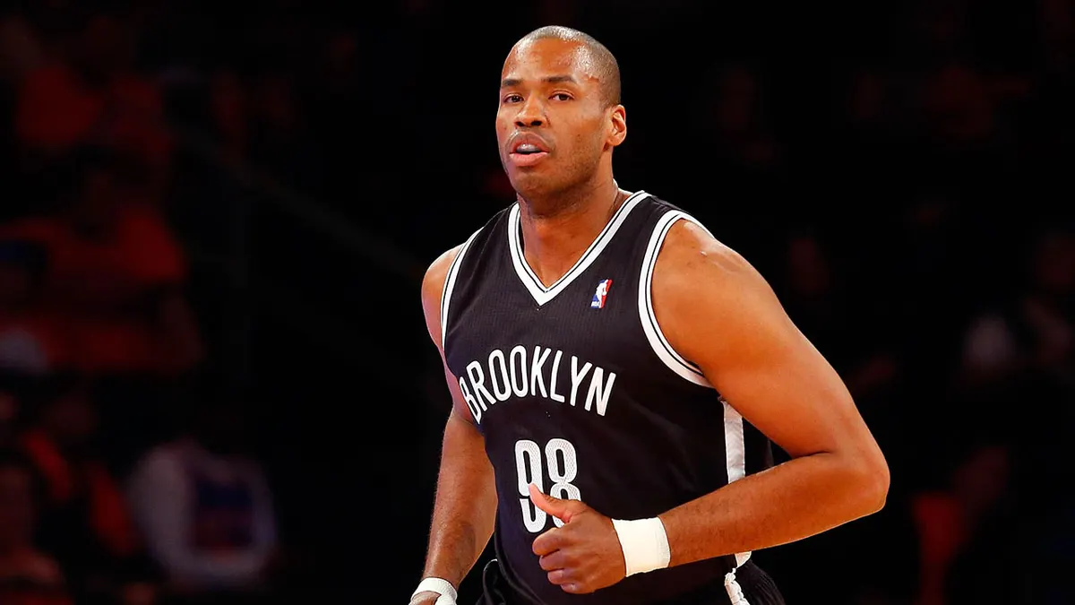 Jason Collins of the Brooklyn Nets running on the basketball court at Madison Square Garden