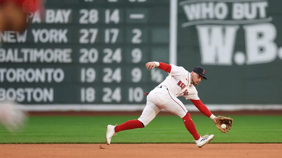 Caleb Durbin fields a ground ball at Fenway Park in Boston