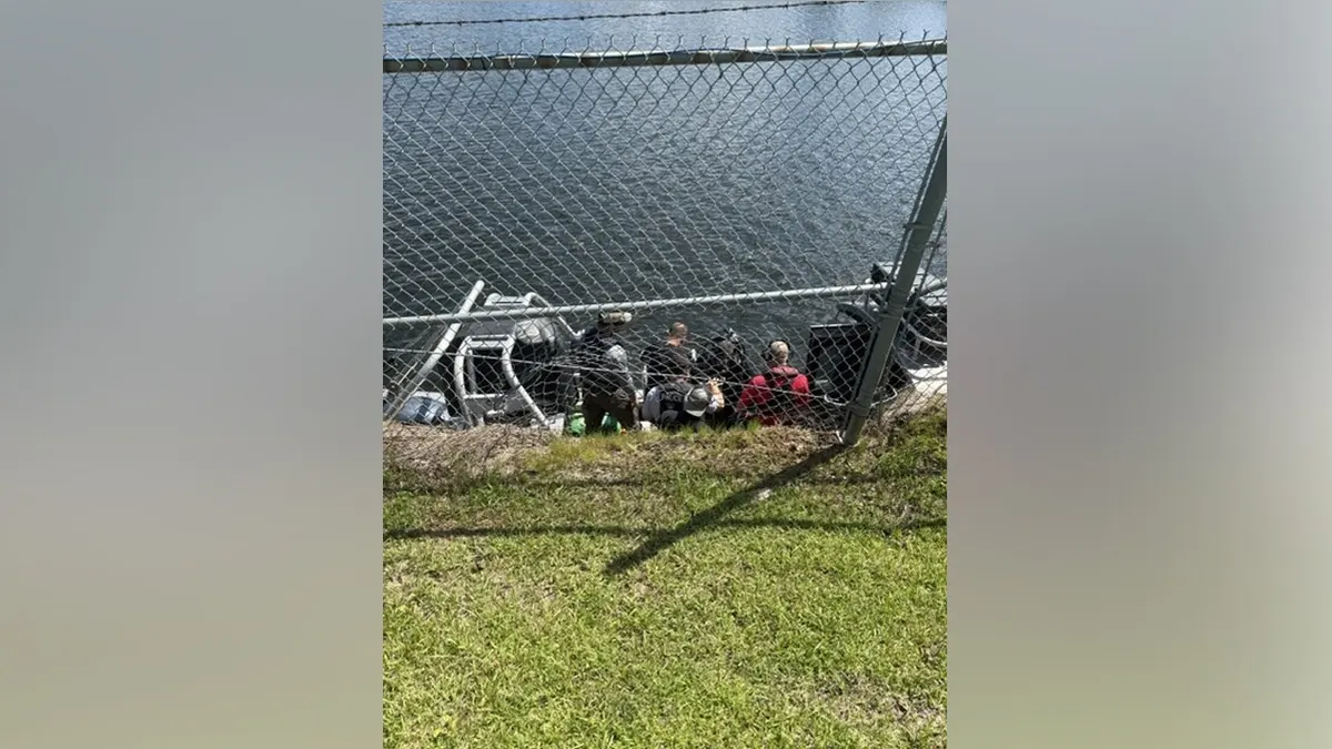 An inter-agency team in Alabama assesses an IED at the Converse Reservoir Dam in Mobile, Alabama.