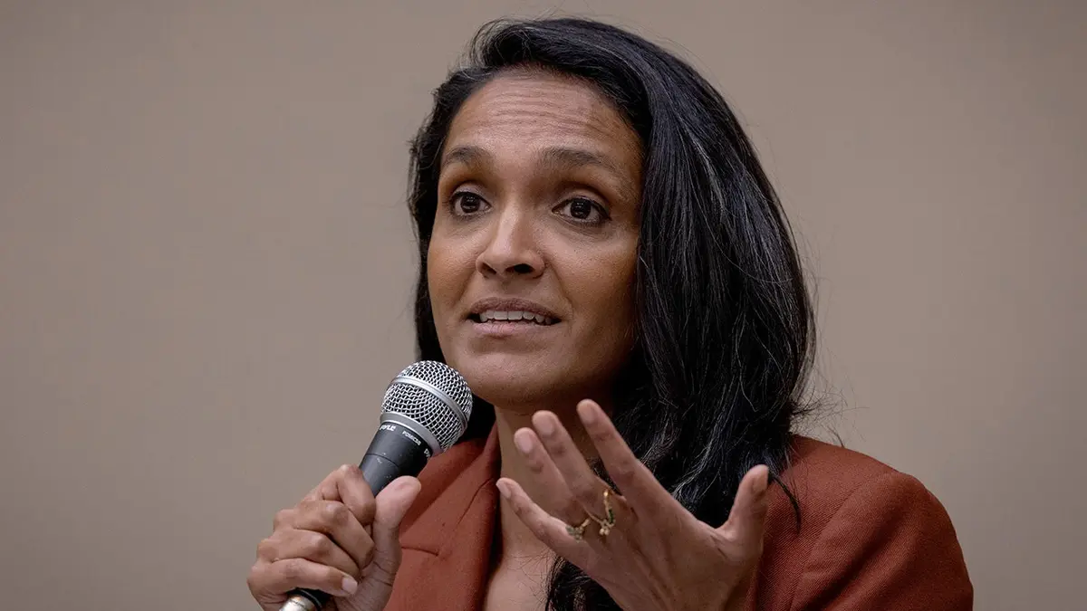 Nithya Raman speaks into a microphone.