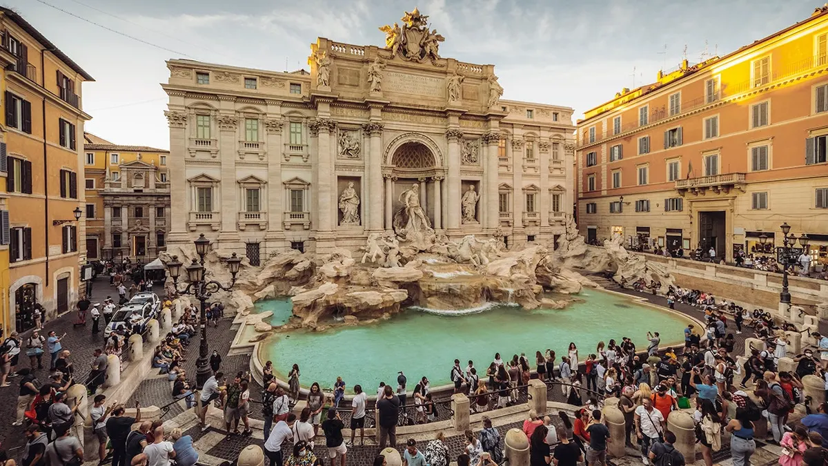 Trevi Fountain with tourists in Rome Italy