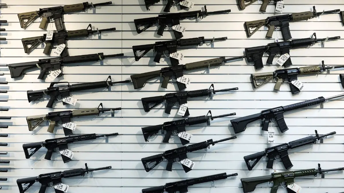 An assortment of semiautomatic rifles on display