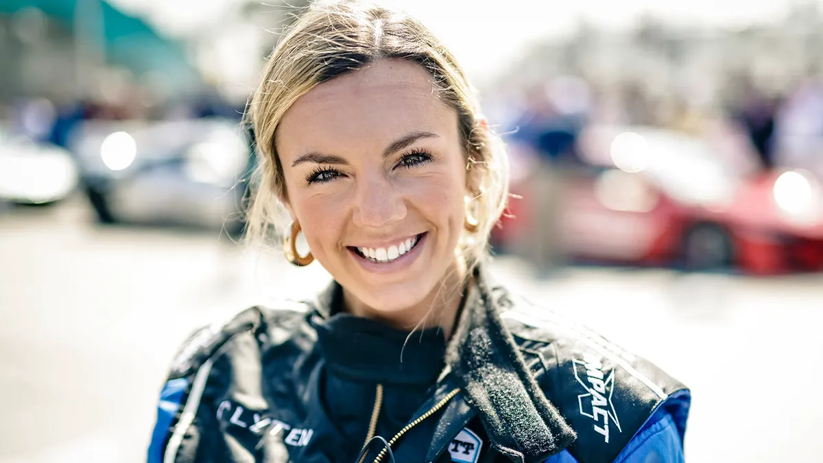 Annie Agar smiling at the IndyCar Experience in Long Beach, California