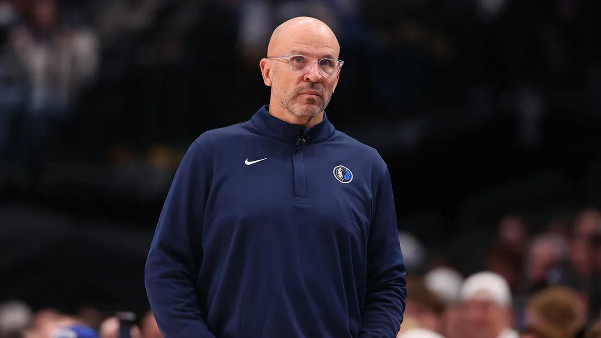 Head coach Jason Kidd of the Dallas Mavericks looking on during a basketball game.