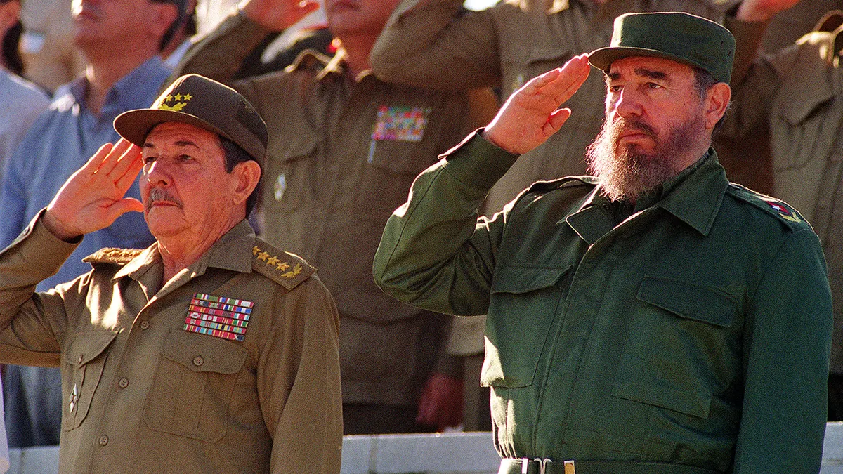 Fidel Castro and his brother Raul Castro attending a parade in Havana Cuba