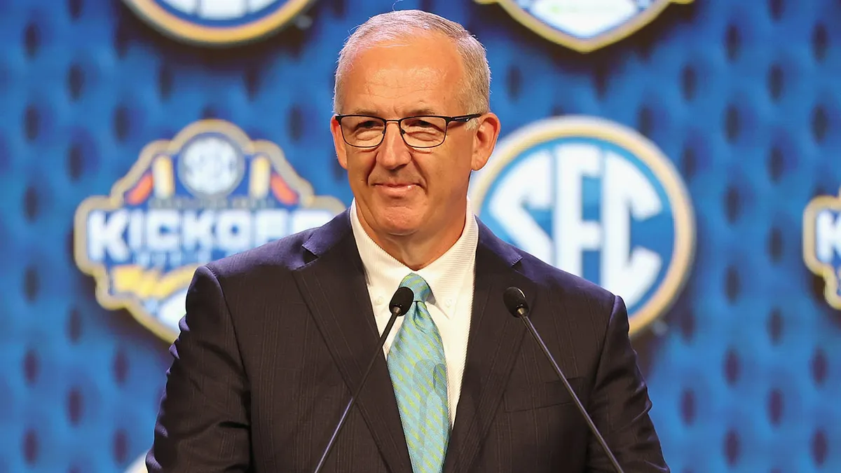 SEC Commissioner Greg Sankey speaking at Omni Dallas Hotel