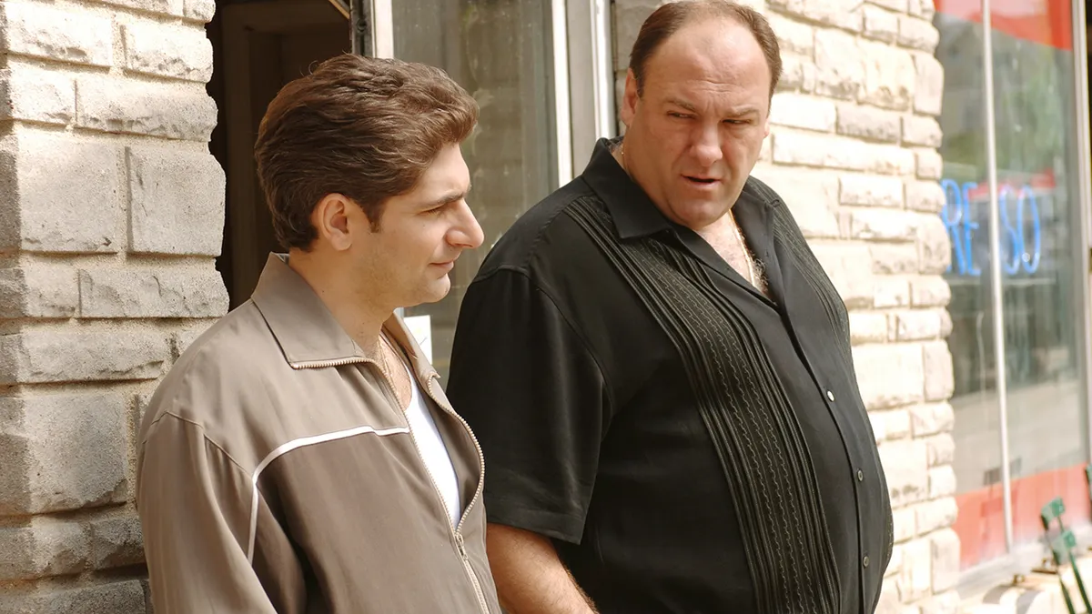 Michael Imperioli and James Gandolfini standing in a scene from The Sopranos