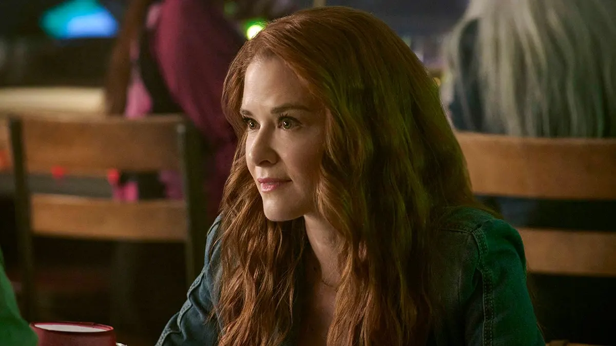 Sarah Drew poses for a portrait in a studio setting while filming 