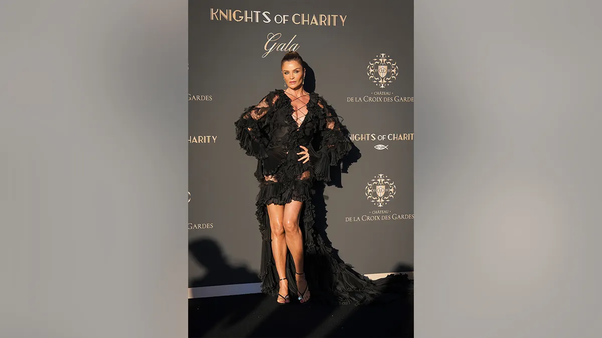Helena Christensen on the red carpet at the Knights of Charity Gala in France in May 2026.
