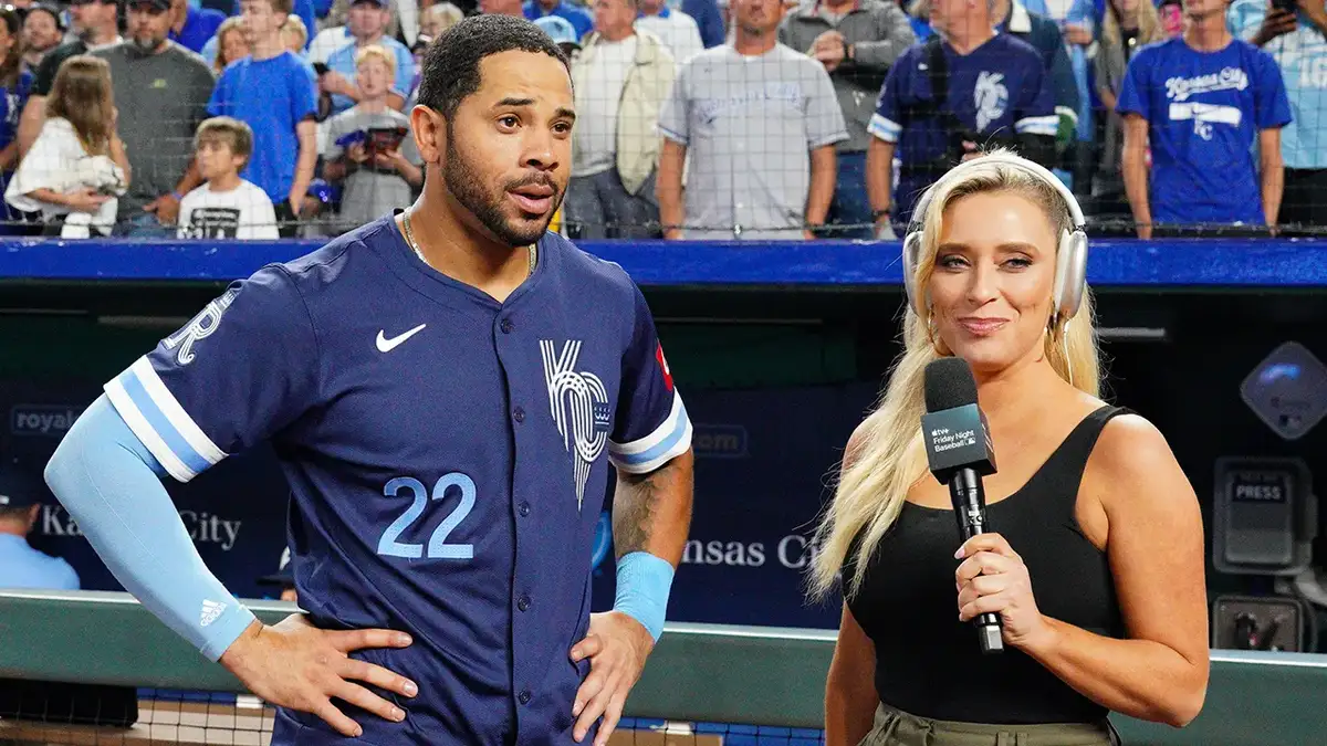 Kansas City Royals left fielder Tommy Pham speaking with Apple reporter Tricia Whitaker at Kauffman Stadium