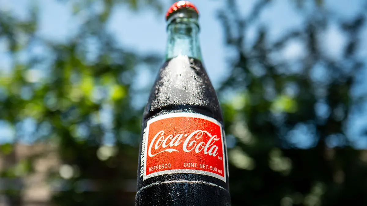 A glass bottle of Coca-Cola imported from Mexico displayed on a table in Austin, Texas