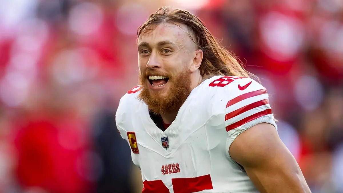 San Francisco 49ers tight end George Kittle running with football at State Farm Stadium