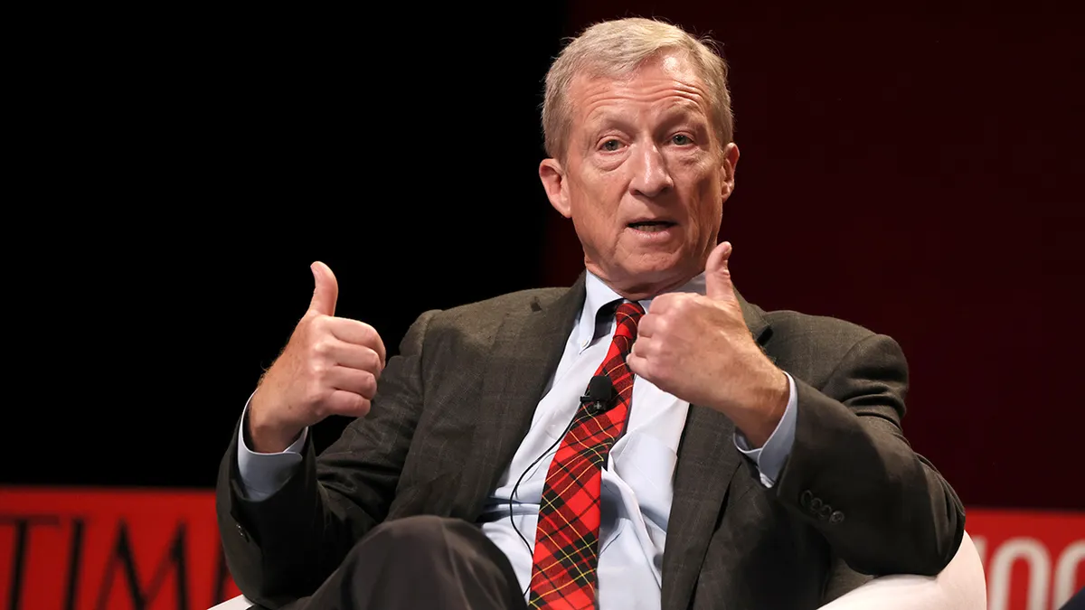Tom Steyer speaking onstage at the 2023 TIME100 Summit in New York City