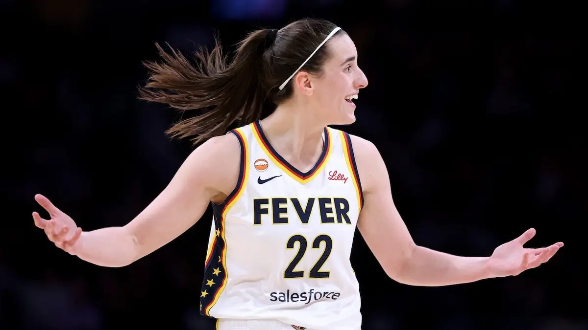 Caitlin Clark arguing for a foul during a basketball game at Crypto.com Arena