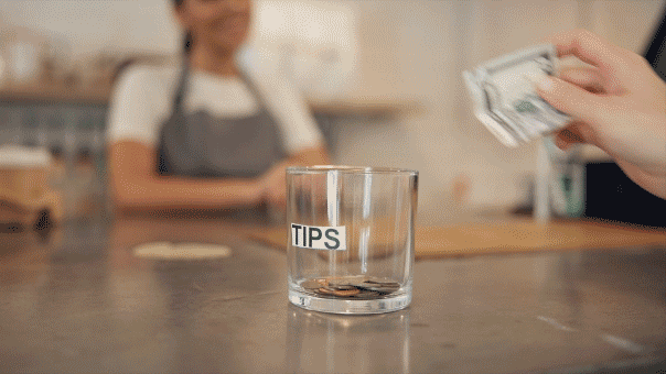 A digital payment screen showing preset tip options