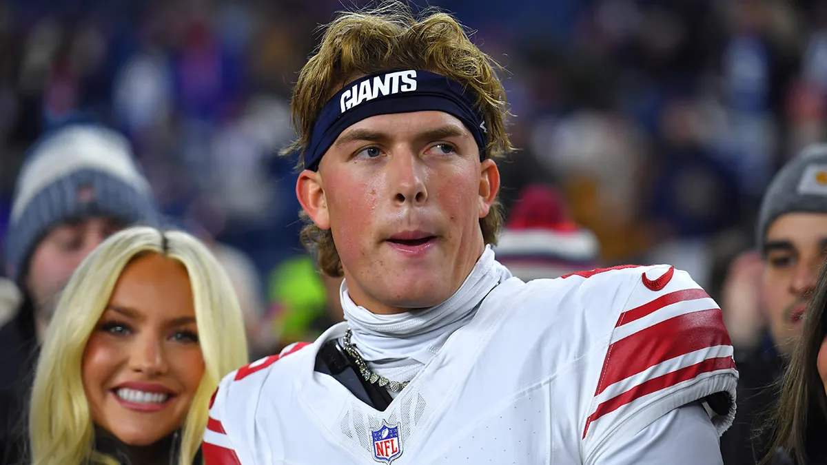 New York Giants quarterback Jaxson Dart looking on before NFL game in Foxborough Massachusetts