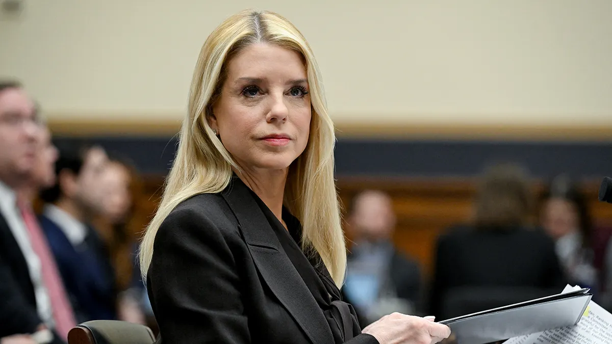 Attorney General Pam Bondi seated at a hearing on Capitol Hill in Washington, D.C.