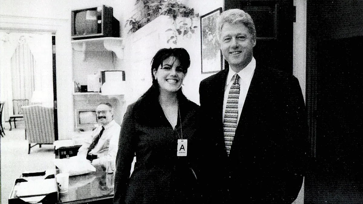 Monica Lewinsky standing next to President Bill Clinton
