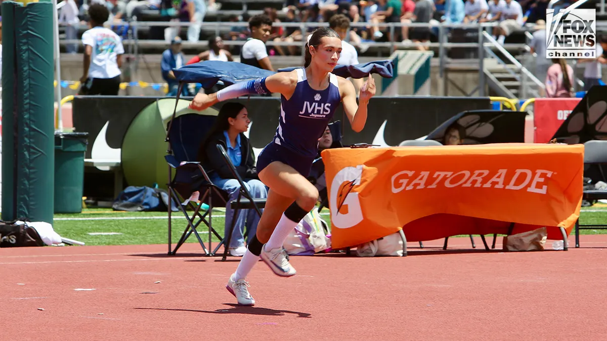 Transgender student athlete AB Hernandez running in a track and field event