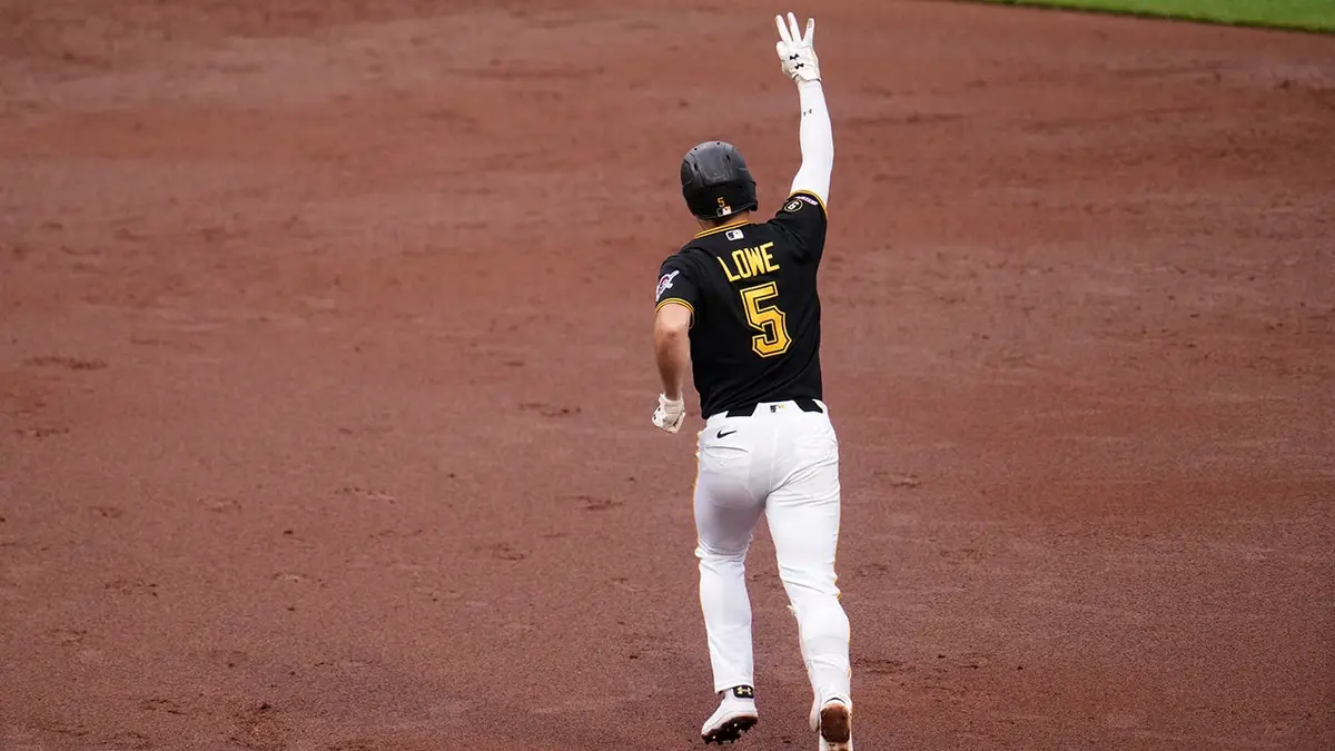 Pittsburgh Pirates' Brandon Lowe rounding bases after hitting home run.
