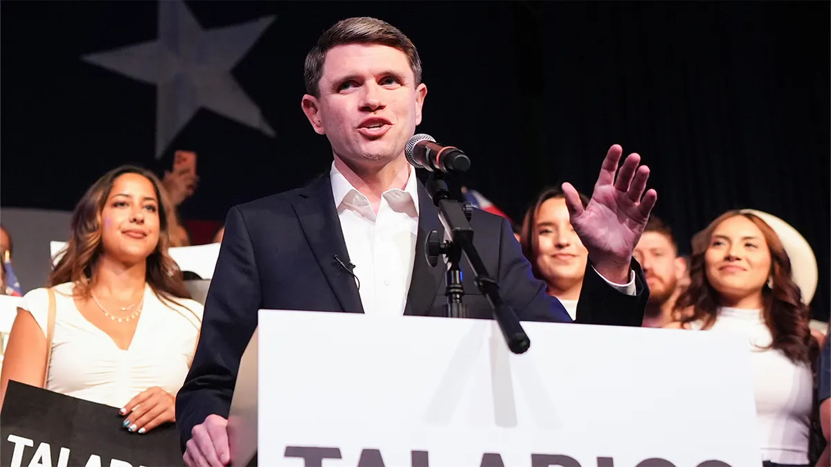 Texas state Rep. James Talarico speaking at a podium
