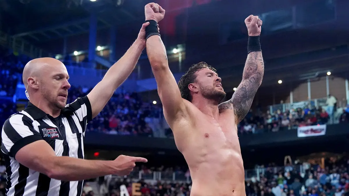 Will Ospreay with his hand raised
