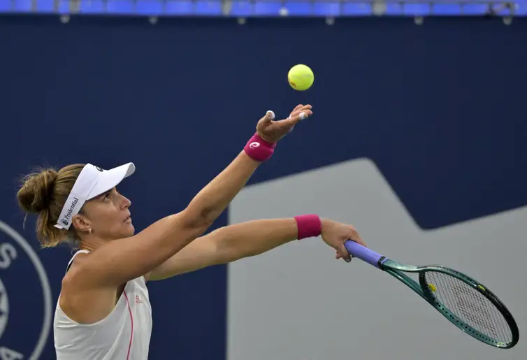 Jul 29, 2025; Montreal, QC, Canada; Beatriz Haddad Maia (BRA) serves against Suzan Lamens (NED) in second round play at IGA Stadium. Mandatory Credit: Eric Bolte-Imagn Images