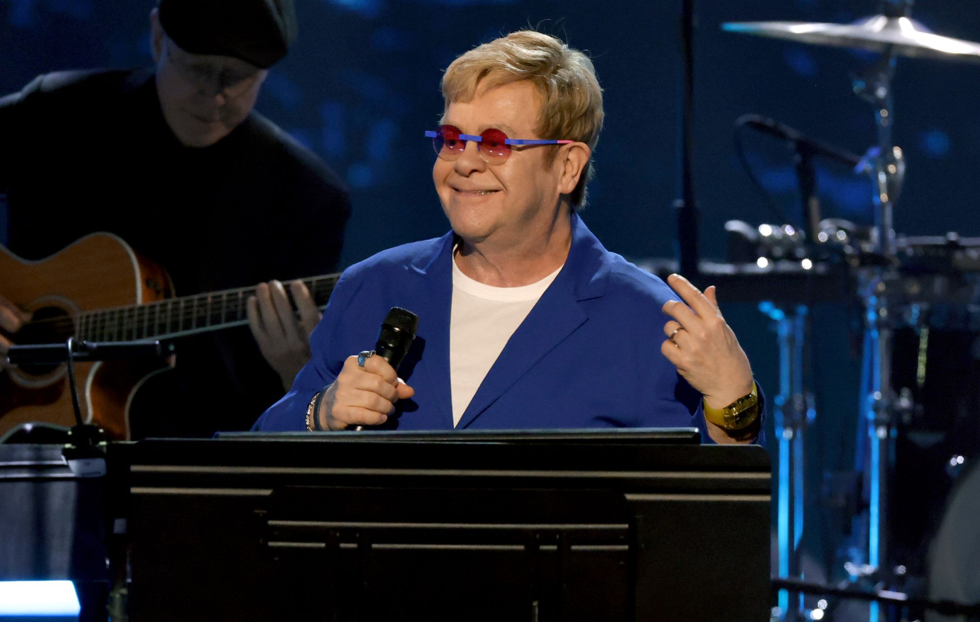 Elton John on stage. CREDIT: Kevin Kane/Getty Images