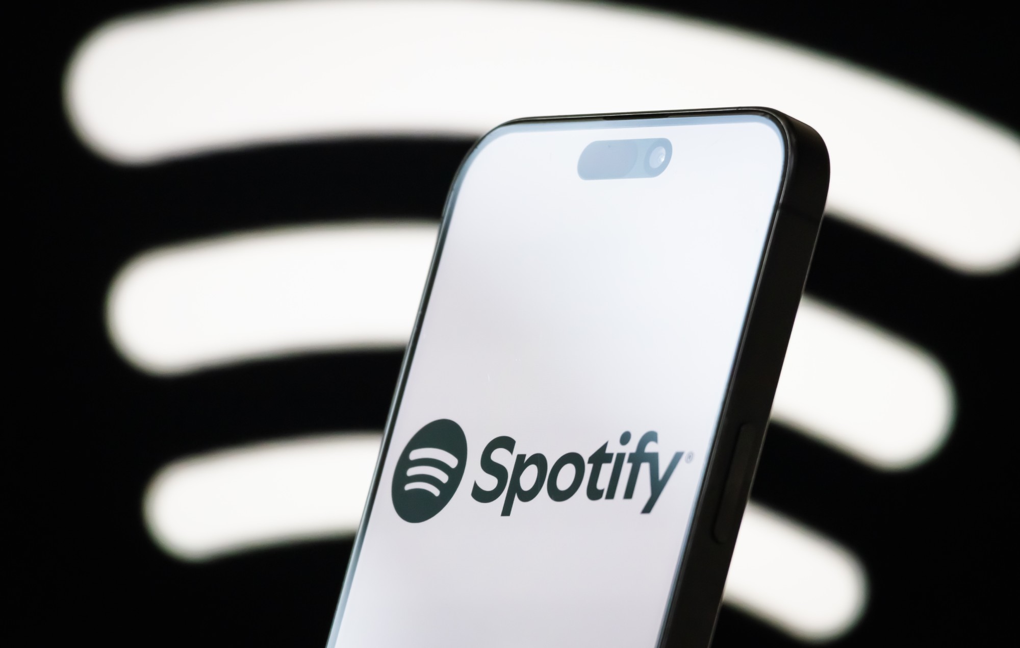 Spotify logo displayed on smartphone screen. CREDIT: Cheng Xin/Getty Images