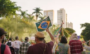 a group of people holding a flag