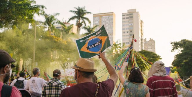 a group of people holding a flag