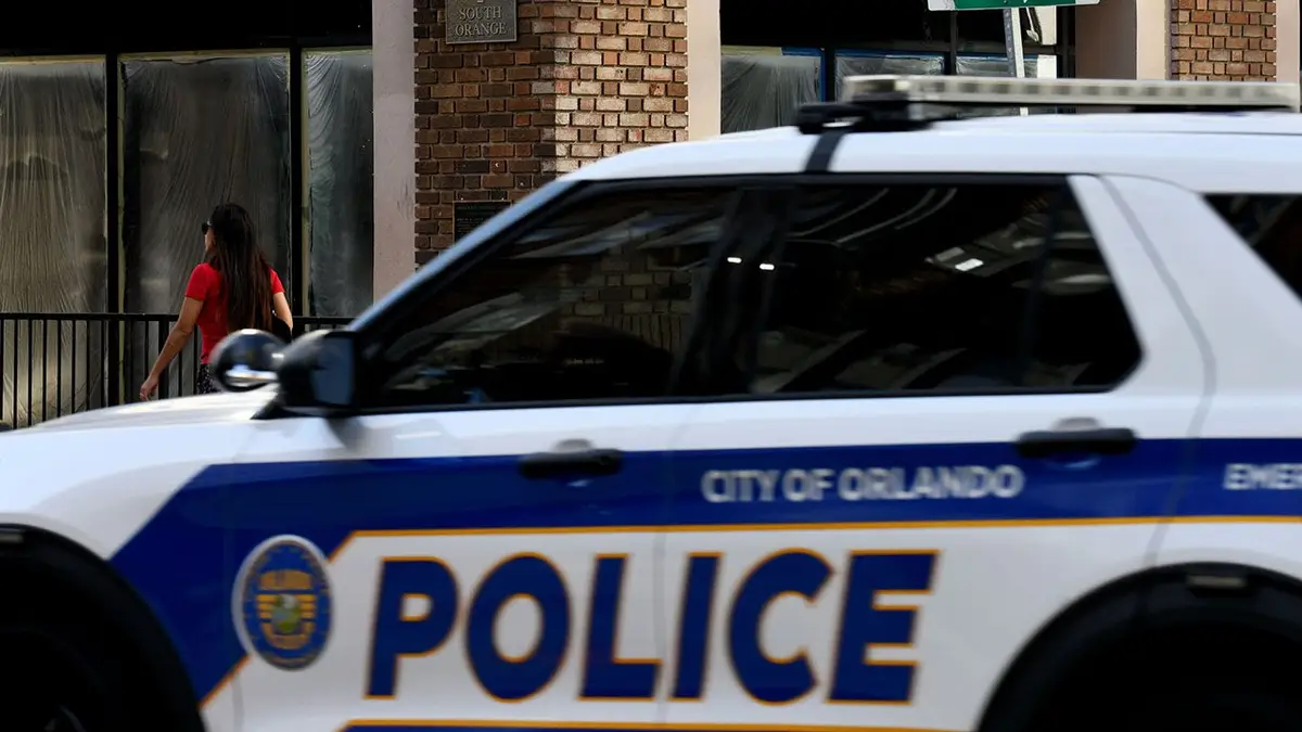 Police officer patrolling Orange Avenue and Central Boulevard in Orlando