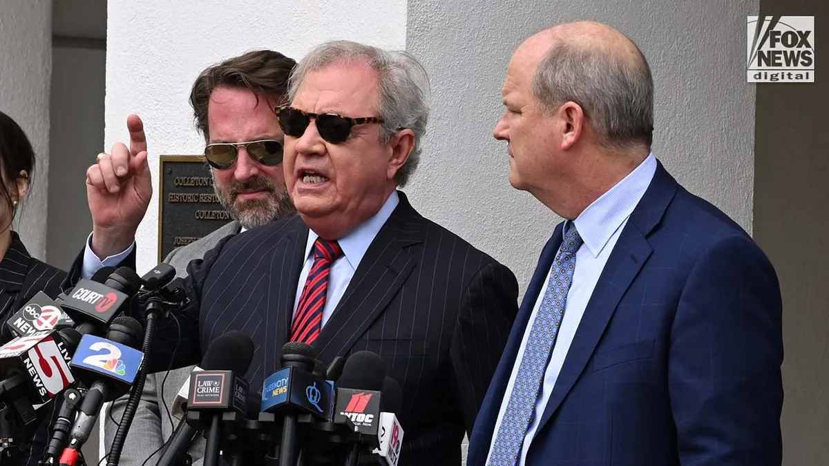 Defense attorney Dick Harpootlian speaking to media with Alex Murdaugh's defense team