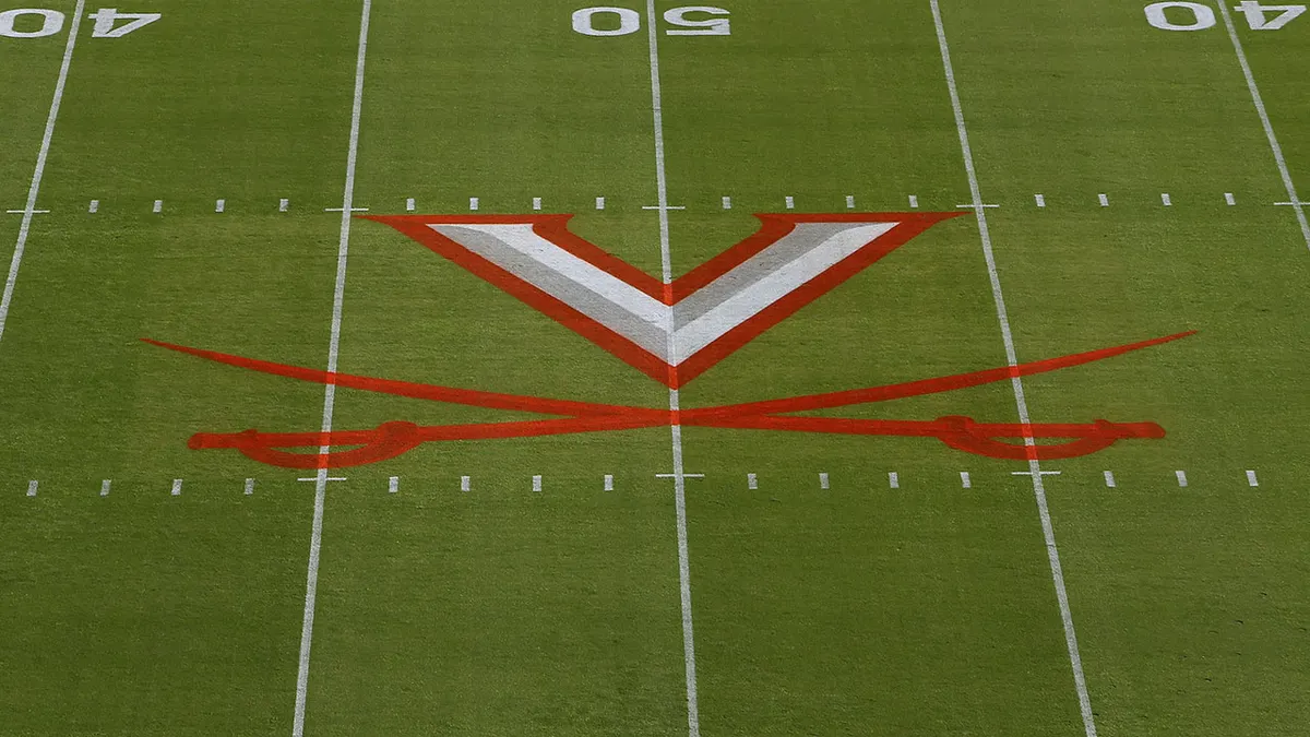 Virginia Cavaliers logo painted on football field at Scott Stadium