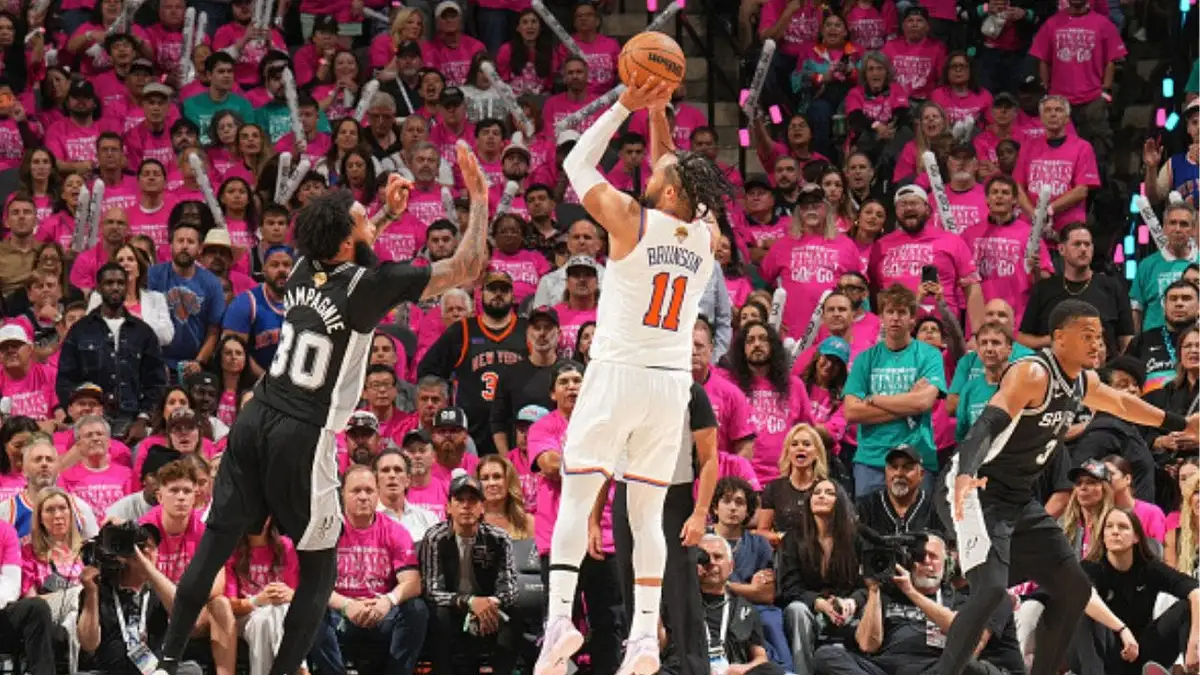 New York Knicks guard Jalen Brunson rises for a shot against the San Antonio Spurs during Game 1 of the 2026 NBA Finals at Frost Bank Center. (Photo by Jesse D. Garrabrant/NBAE via Getty Images)