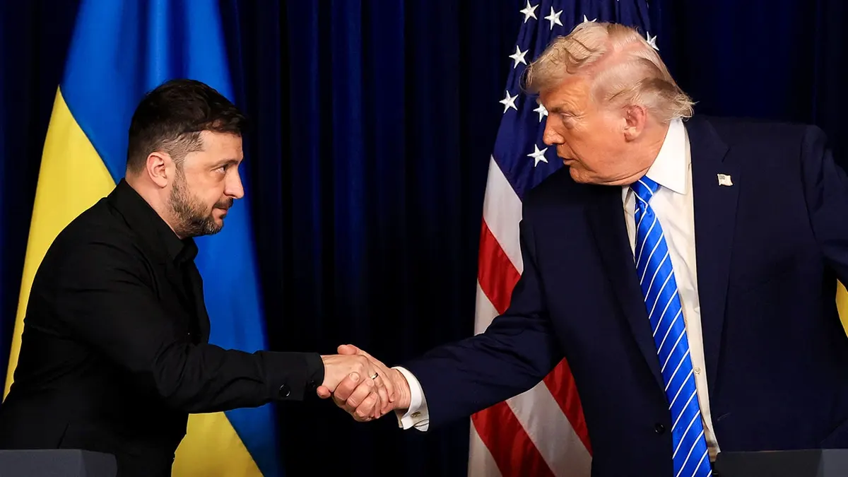 Ukrainian President Volodymyr Zelenskyy shakes hands with U.S. President Donald Trump