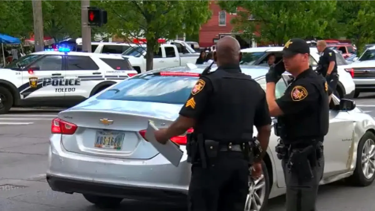 A large police presence remained in the area on June 6, 2026, as officers searched for those responsible for the shooting near the Old West End Festival in Toledo, Ohio.