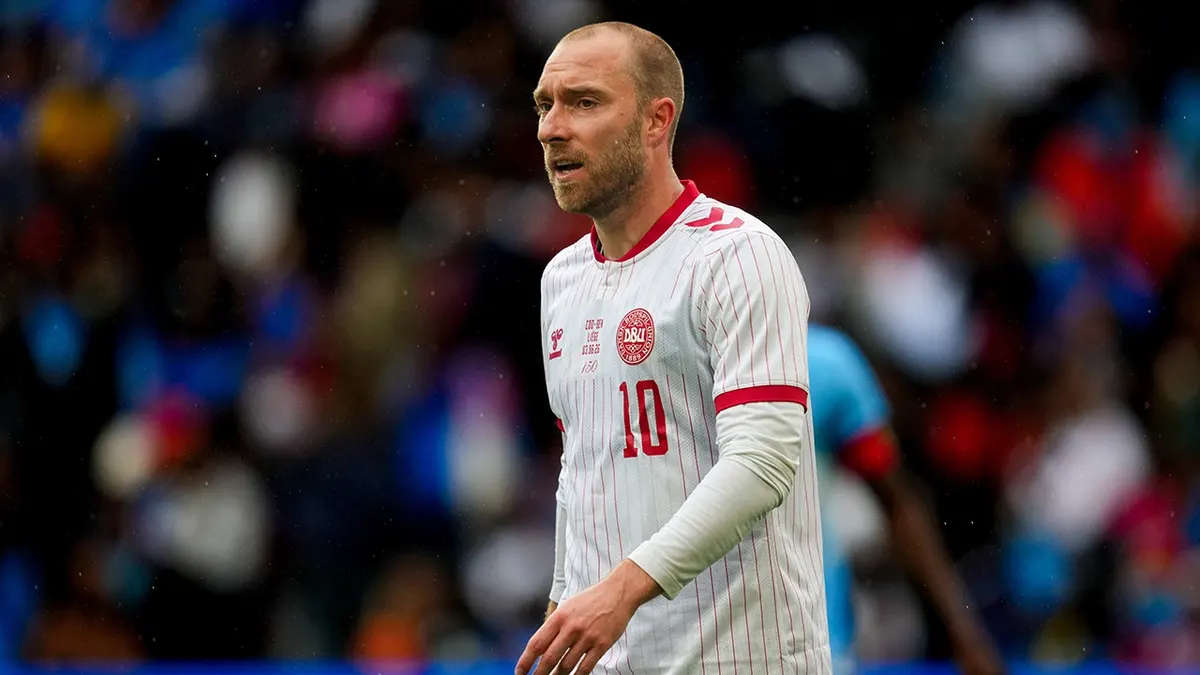 Christian Eriksen looking on during a soccer match at Stade Maurice Dufrasne in Liege Belgium