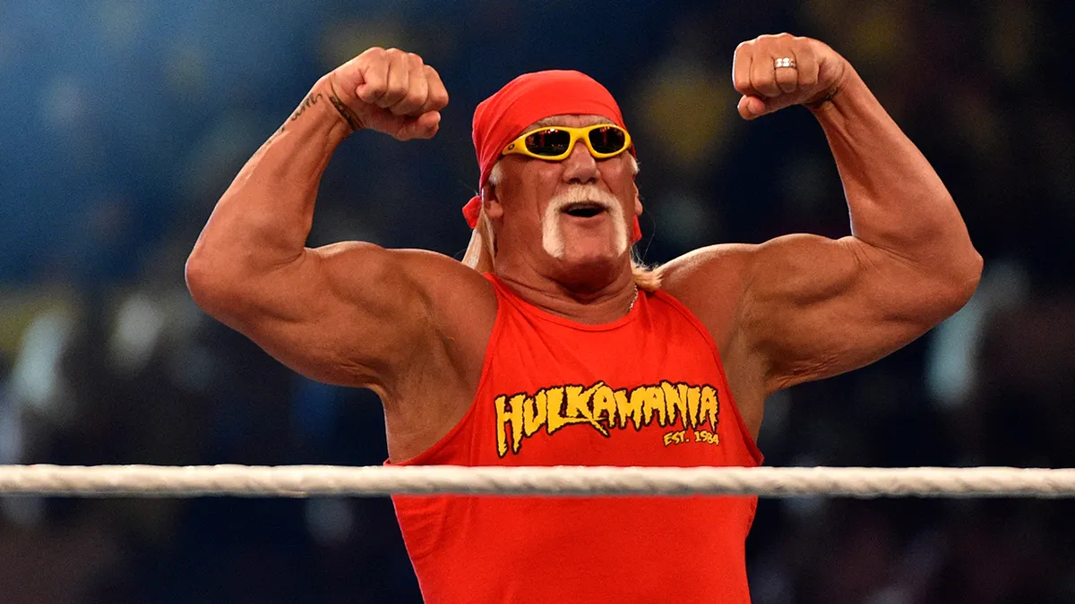 Wrestling legend Hulk Hogan flexing his muscles at King Saud University Stadium in Riyadh